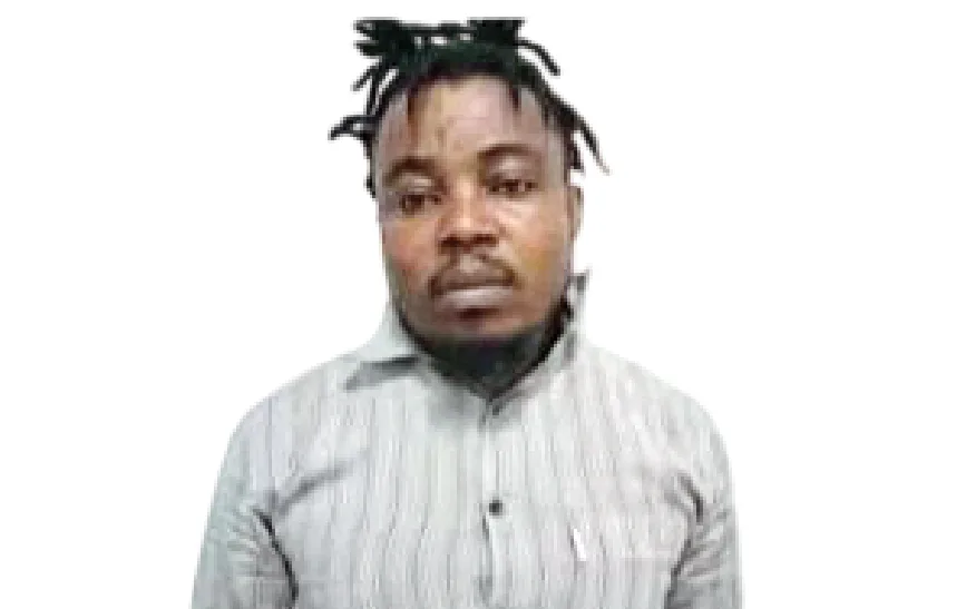 A Nigerian man being arrested by Indian police.
