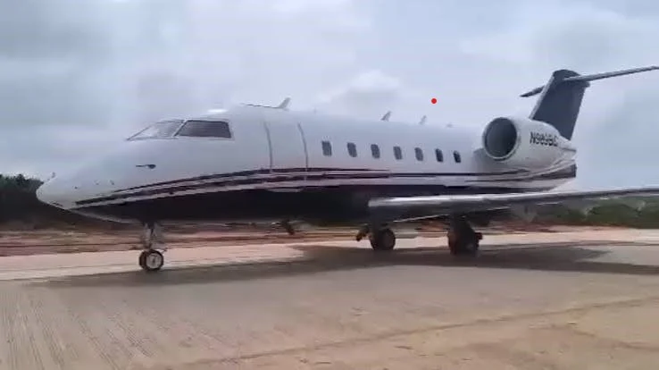 A private jet on a highway.