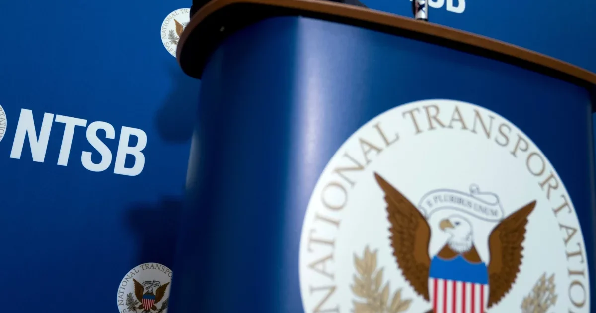 National Transportation Safety Board logo at a press briefing facility
