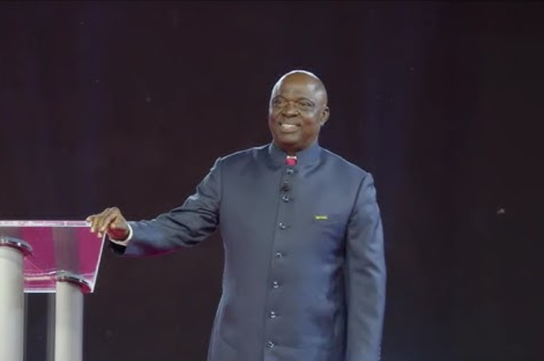 Apostle Joshua Aghasedo speaking from a pulpit.
