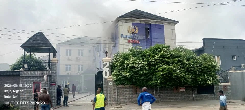 Firefighters at a hotel fire scene in Lagos